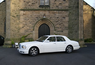 Bentley wedding car outside church