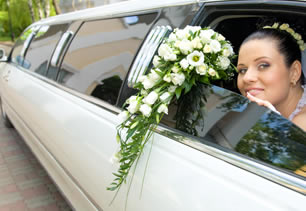 Bride sitting in car