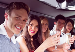 Friends travelling in limousine