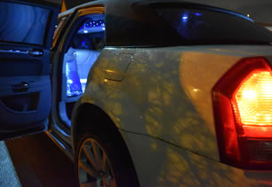 Interior lights of limousine at night