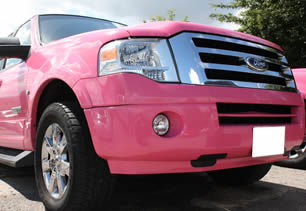 Front view of our pink limo in Lancashire
