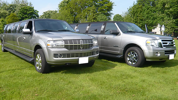 Silver 12-seater Hummer limousine style SUVs